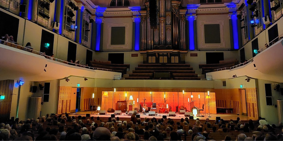 View of concert hall and people watching a show